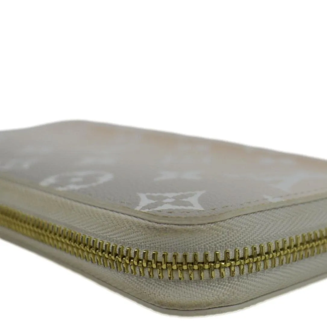 LOUIS VUITTON By The Pool Zippy Mnogram Coated Canvas Wallet Brume