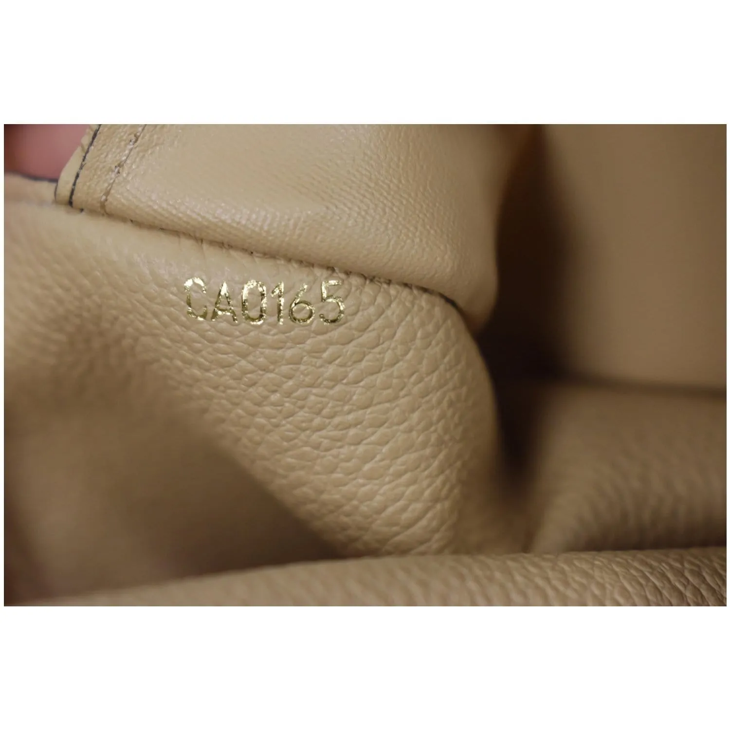 LOUIS VUITTON Curieuse Monogram Empreinte Leather Wallet Bronze