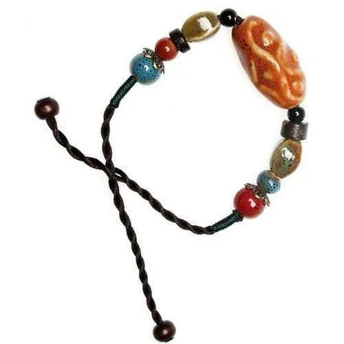 Pumpkin Orange Ceramic Beads And Hemp Cord Adjustable Bracelet